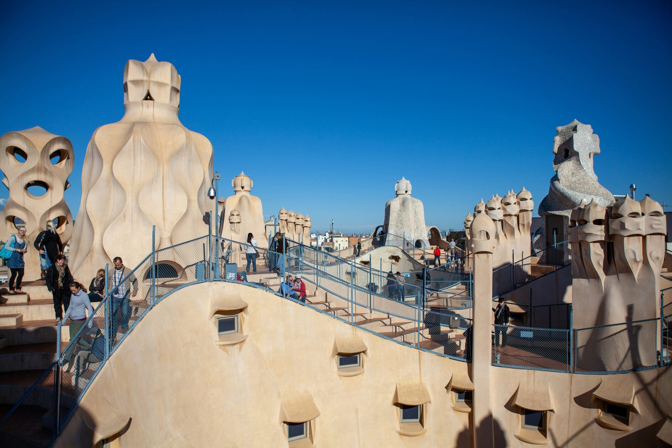 Rooftop terrace of Casa Batlló with artistically designed chimneys