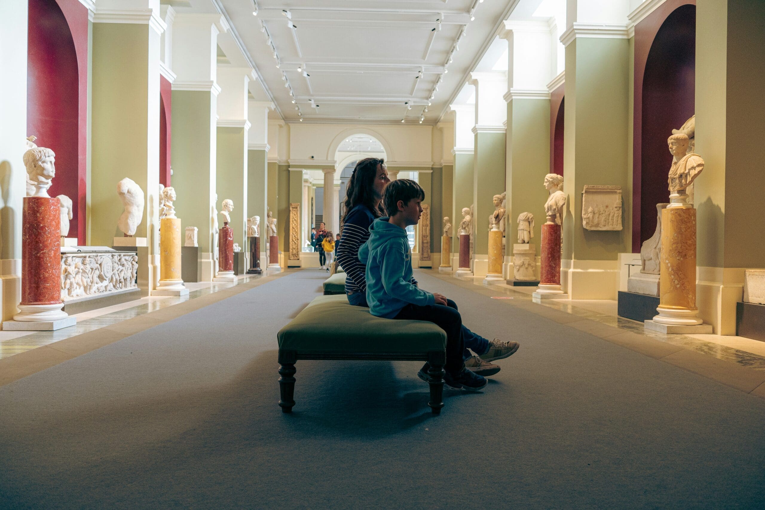 Visitors at the museum engaging with exhibits