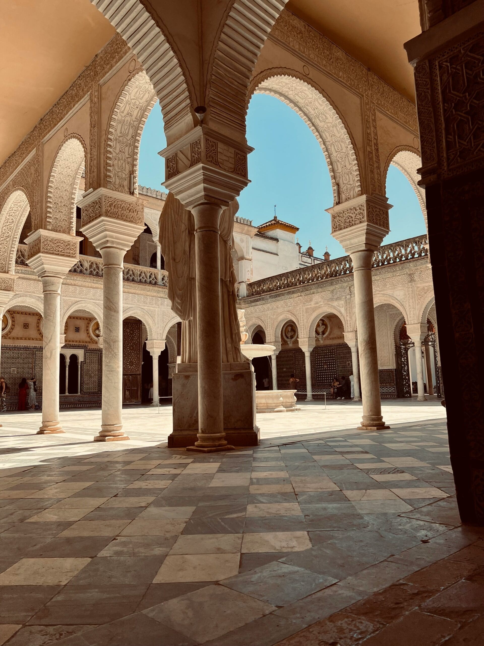 Quiet courtyard in the Casa de Pilatos with azulejos