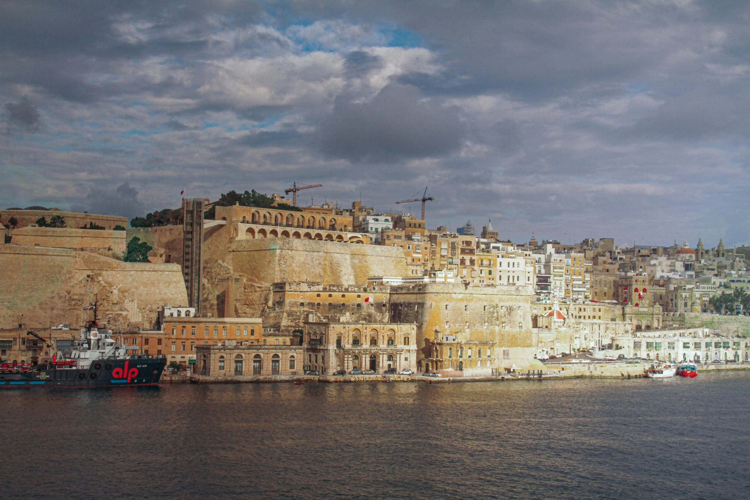 View of the harbor and the old town at sunset