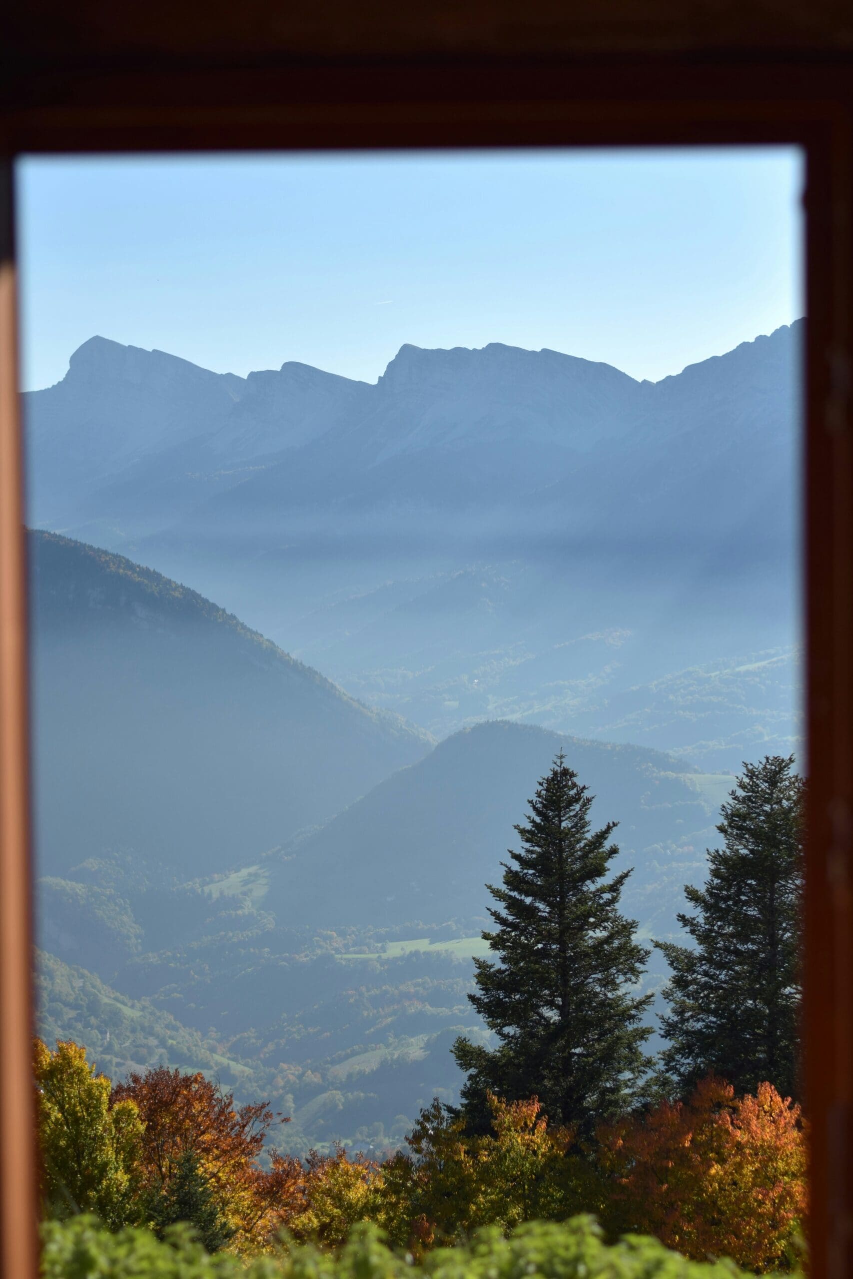 View from a restaurant window with mountains in the background