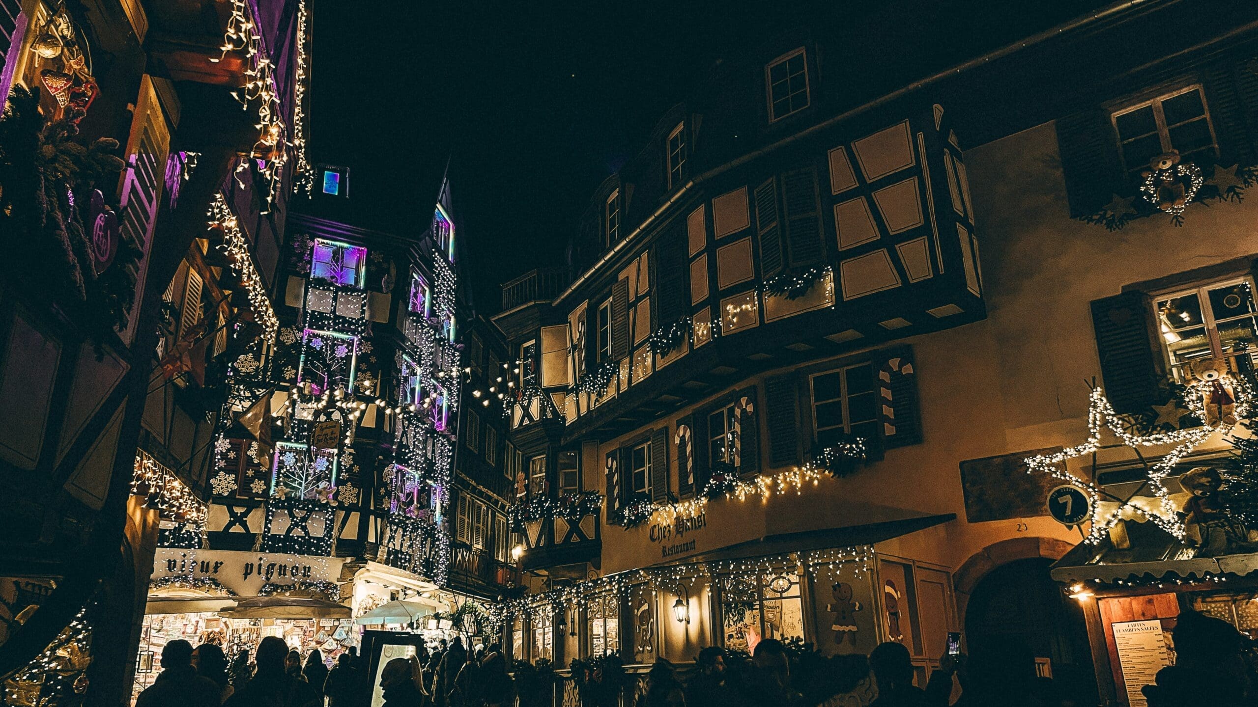 A festive Christmas market in Colmar with lights